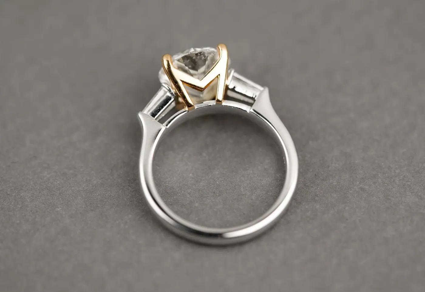Platinum mix yellow gold ring with 3 carat Diamond and baguette at side — view 2